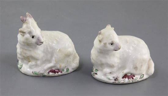 Two early Bow figures of young goats lying recumbent, c.1752-5, l. 5.5cm, ears and horns restored